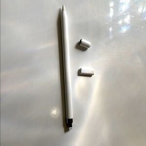 Apple Pencil (first gen) with cap and charger adapter